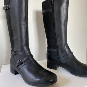 Tall black leather winter boots